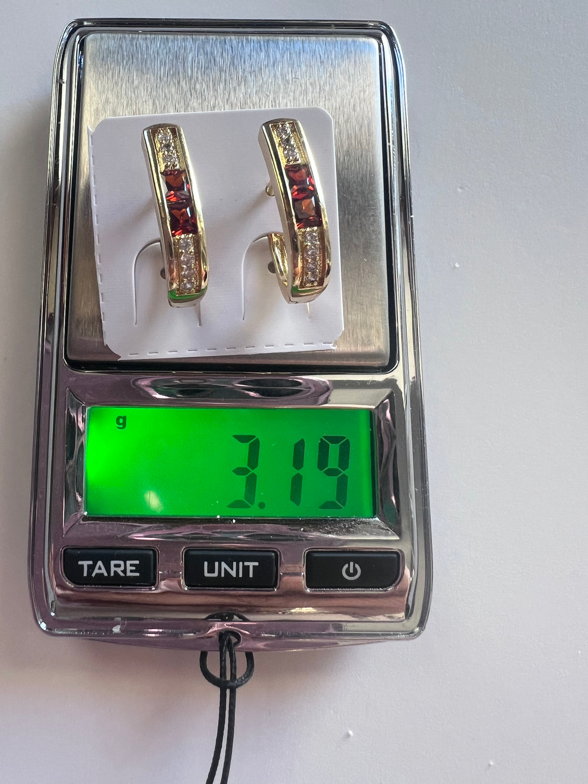 Aretes tipo argolla con piedras marrón transparente – Oro laminado XP 14K